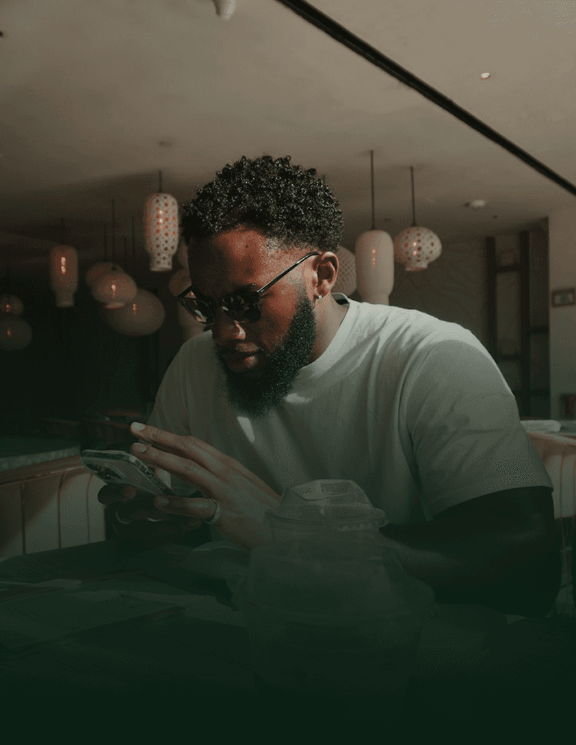 Crypto Holder managing assets on phone